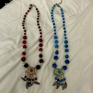 Two burgundy red and turquoise‎ blue Moroccan necklaces